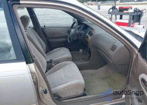 1997 Toyota Corolla Dx z USA, uszkodzony, nr VIN 1NXBB02E9VZ625990